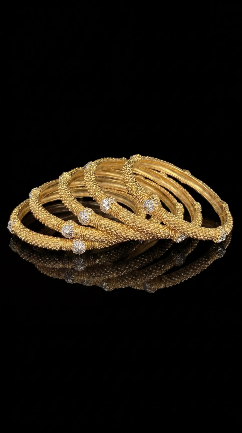 Golden Harmony stack of 6 gold bangles